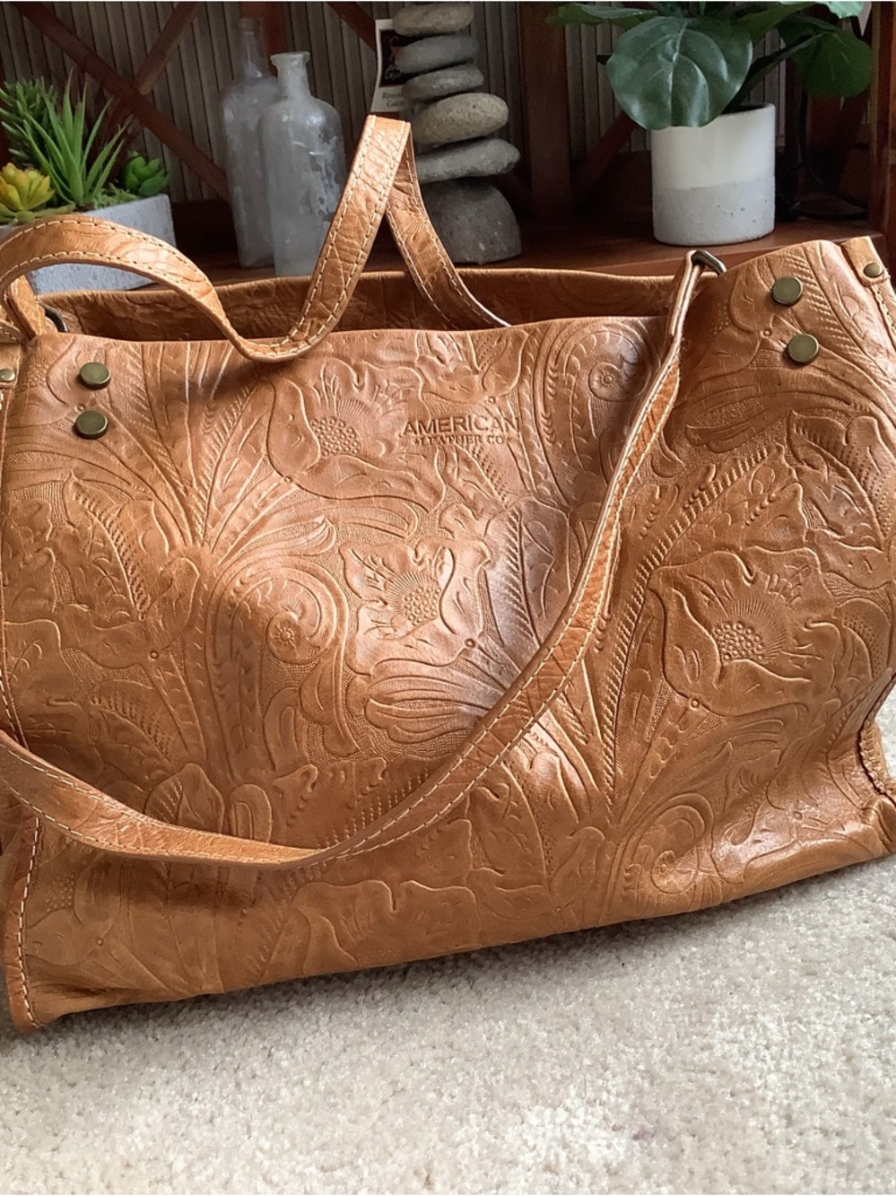 American Leather Co, tooled leather handbag.